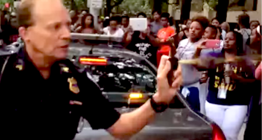 Cleveland Cop Uses Pepper Spray On Peaceful Protesters 